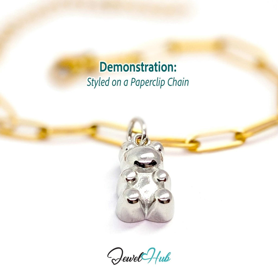 Silver classic Gummy Bear charm styled on a gold paperclip chain bracelet for a two-tone look - JewelHub