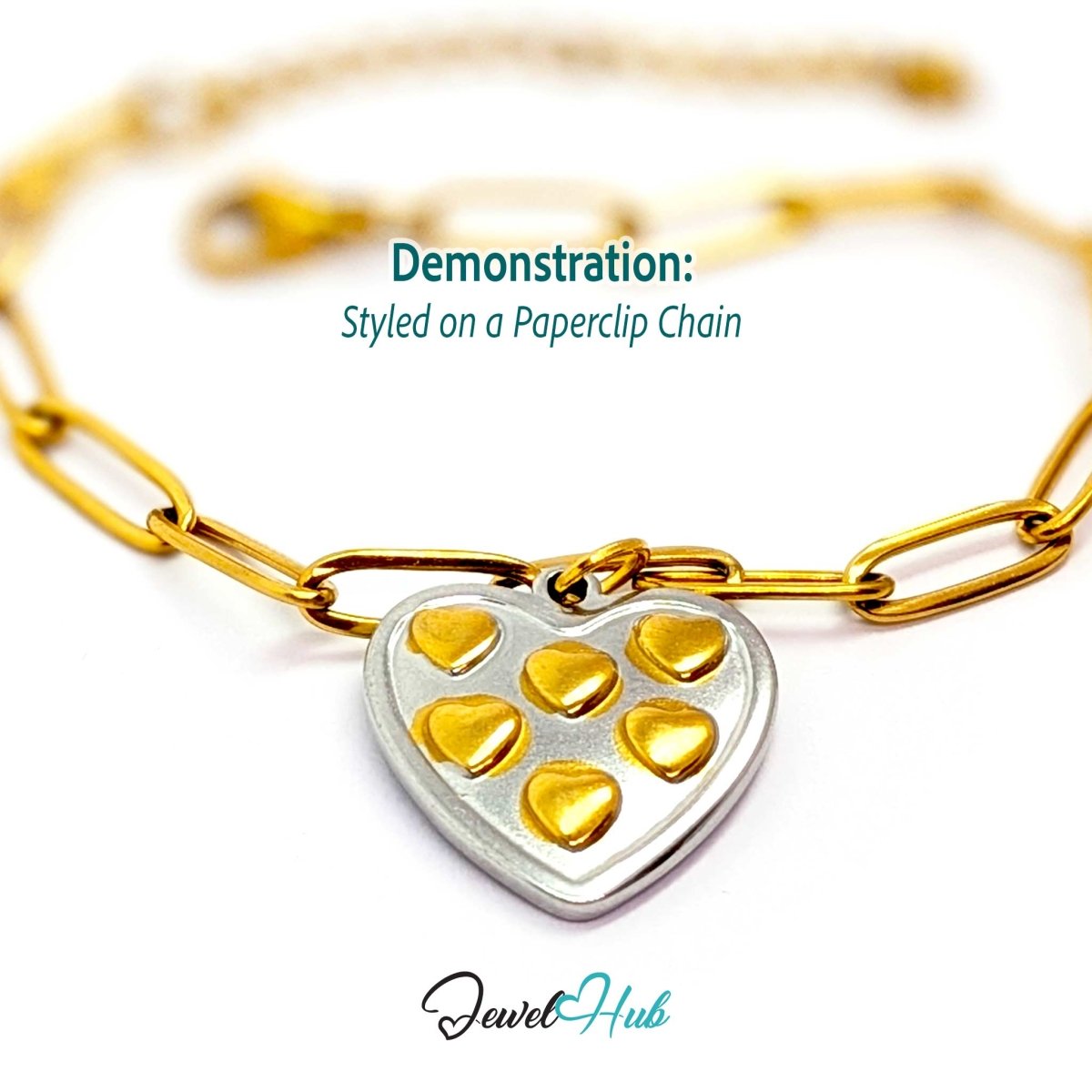 Two-tone Heart Cluster charm styled on a gold paperclip chain bracelet - JewelHub