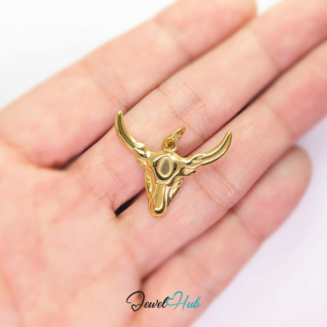 Longhorn bull head charm in gold stainless steel with wide sweeping horns - JewelHub