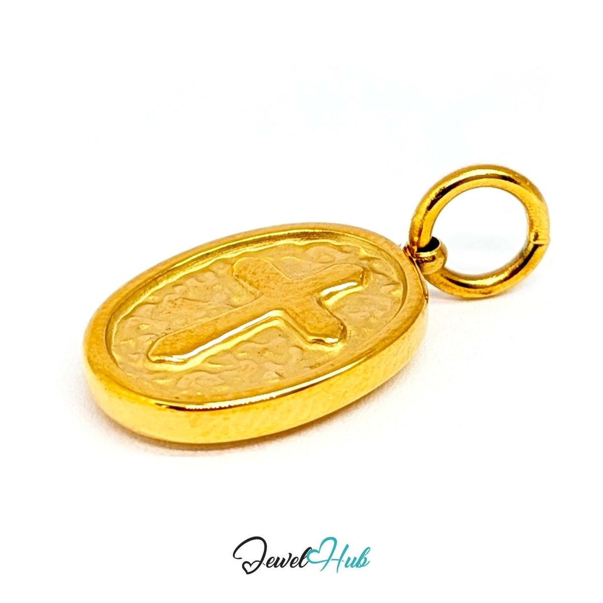 Oval cross medallion charm in gold stainless steel - angled view - JewelHub