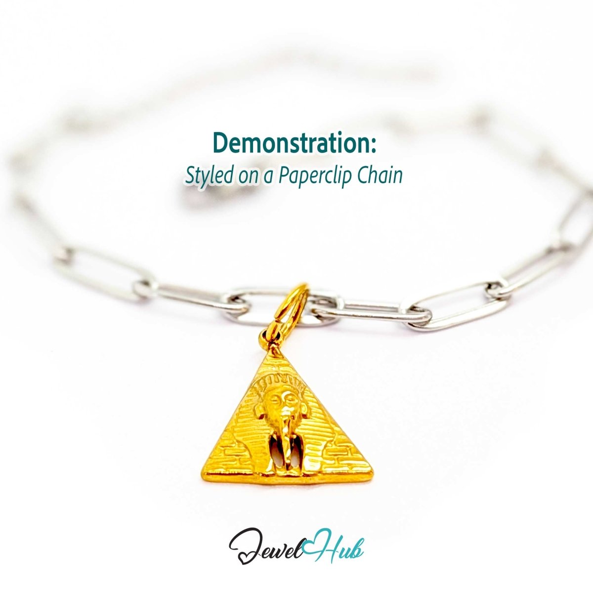 Pyramid and Sphinx charm in gold stainless steel - styled on a silver paperclip chain bracelet - JewelHub