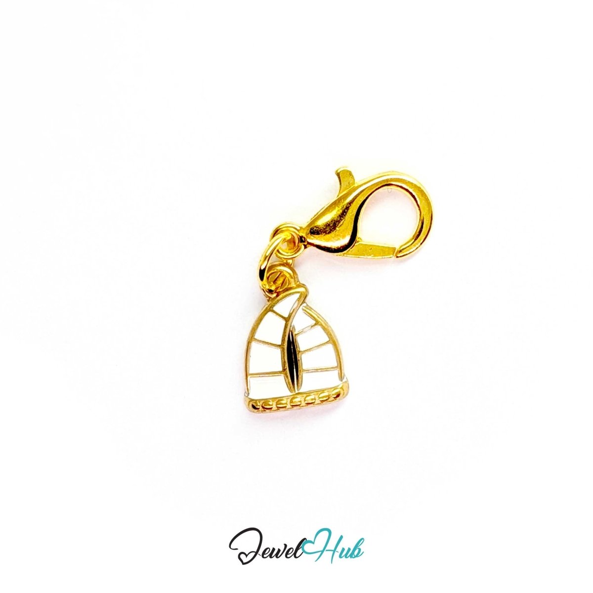 Sailboat charm in gold stainless steel with an openwork sail - shown with the lobster clasp attached - JewelHub