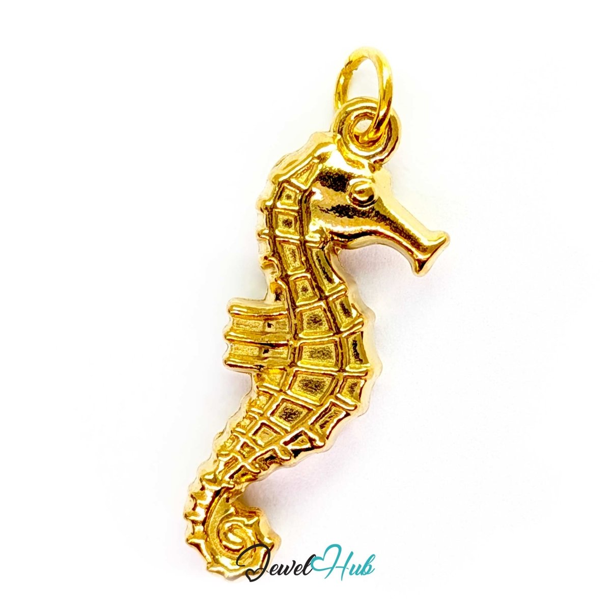 Seahorse charm in gold stainless steel, sculpted in the round with ridged body plates - JewelHub