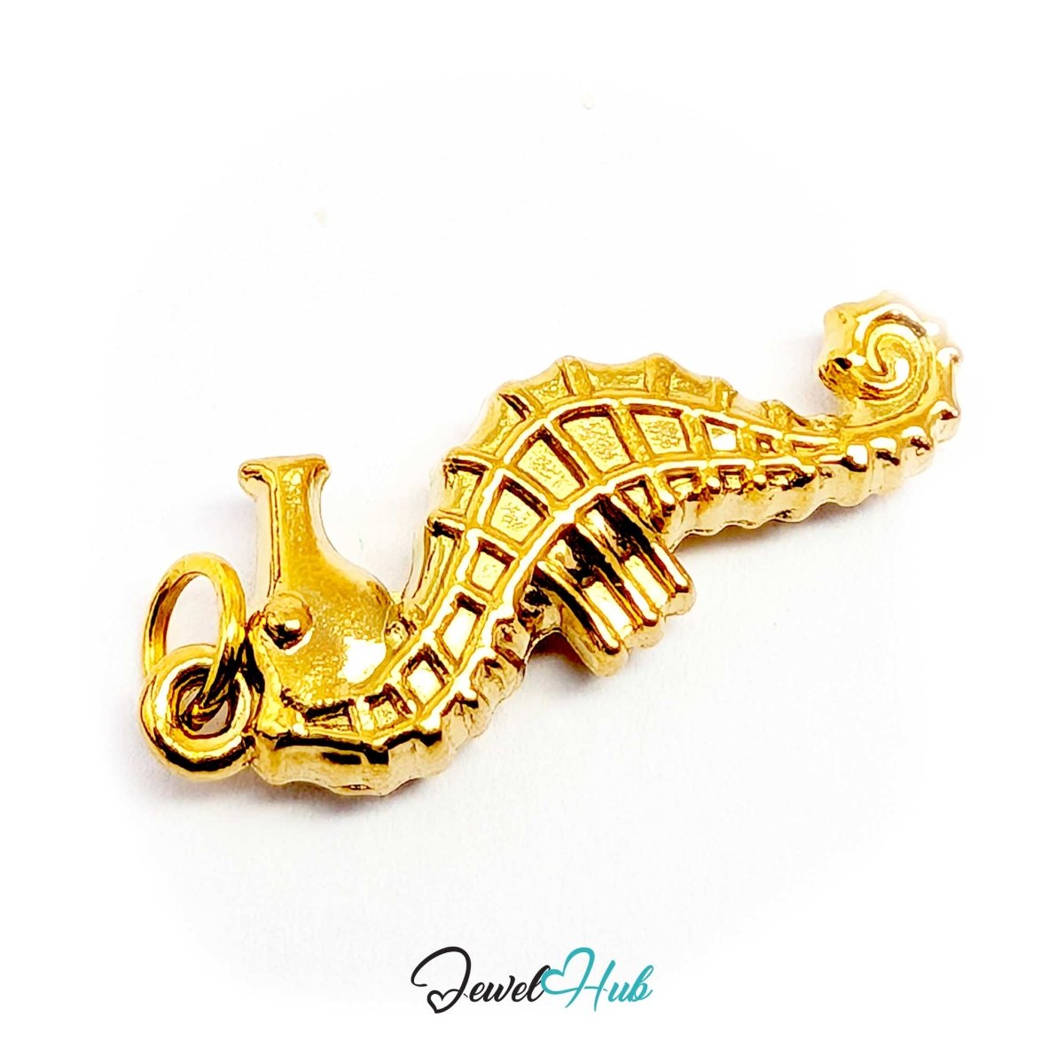 Gold seahorse charm on its side, showing the tail curled into a tight spiral - JewelHub