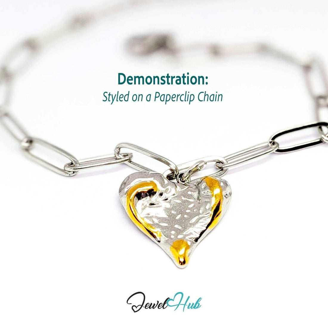 Textured Heart charm, two-tone stainless steel, styled on a silver paperclip chain bracelet - JewelHub