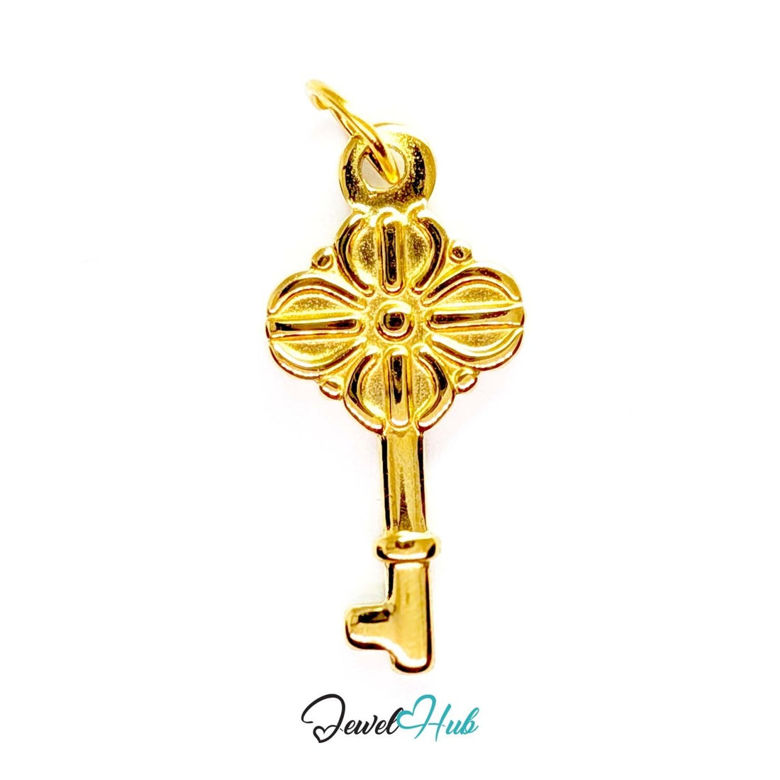 Vintage key charm in gold stainless steel with a quatrefoil bow - front view - JewelHub