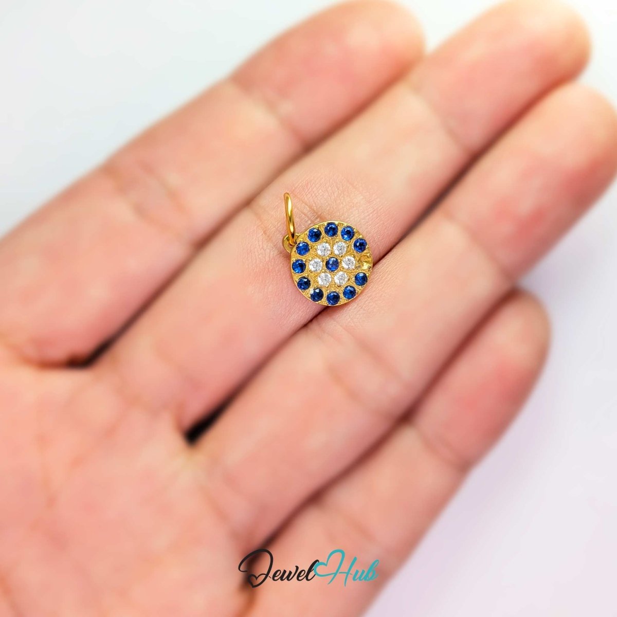 Blue Pave charm, gold stainless steel, held in the hand to show its size - JewelHub