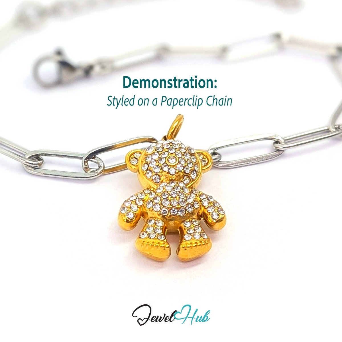 Gold crystal Cuddle Bear charm styled on a silver paperclip chain bracelet for a two-tone look - JewelHub