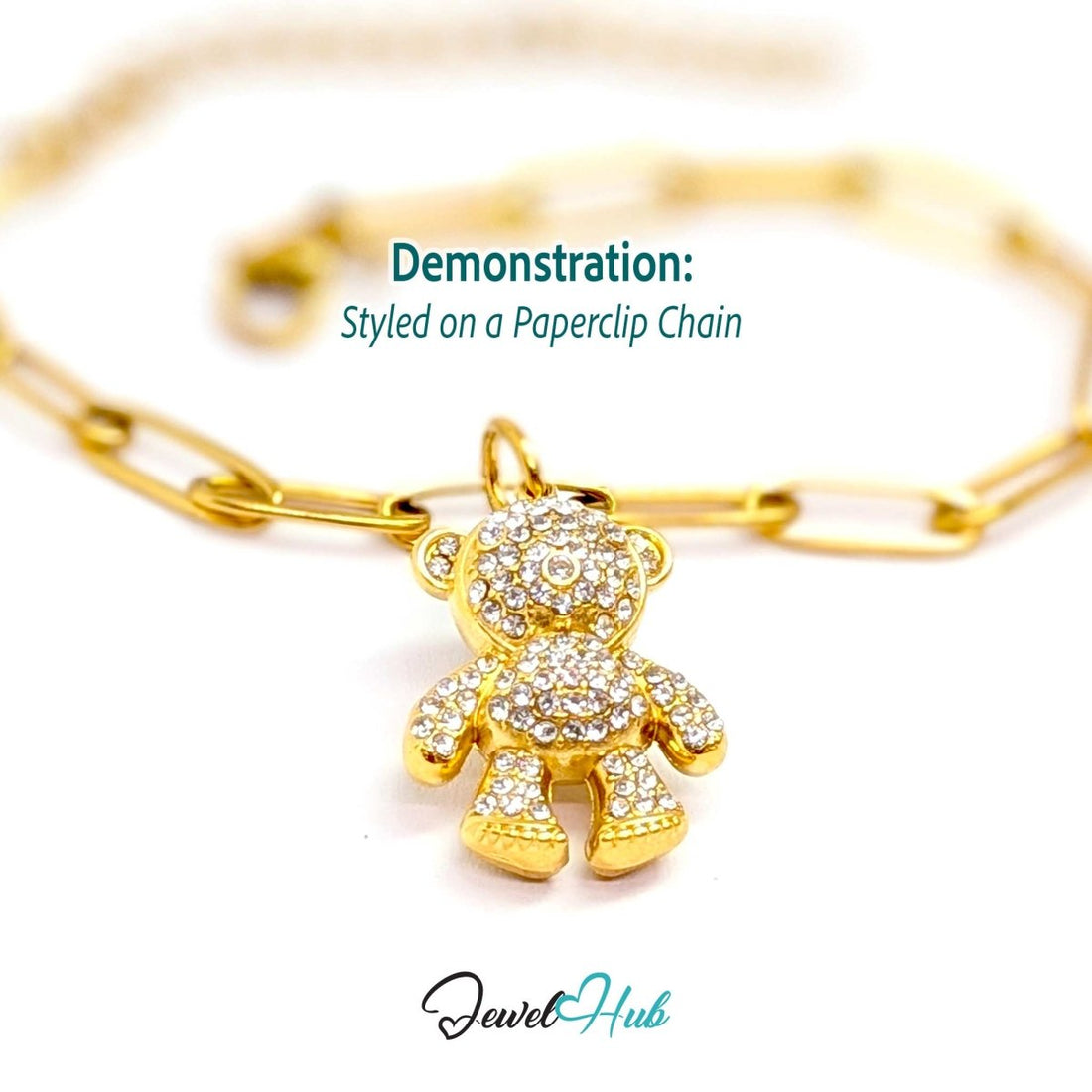 Gold crystal Cuddle Bear charm styled on a gold paperclip chain bracelet - JewelHub