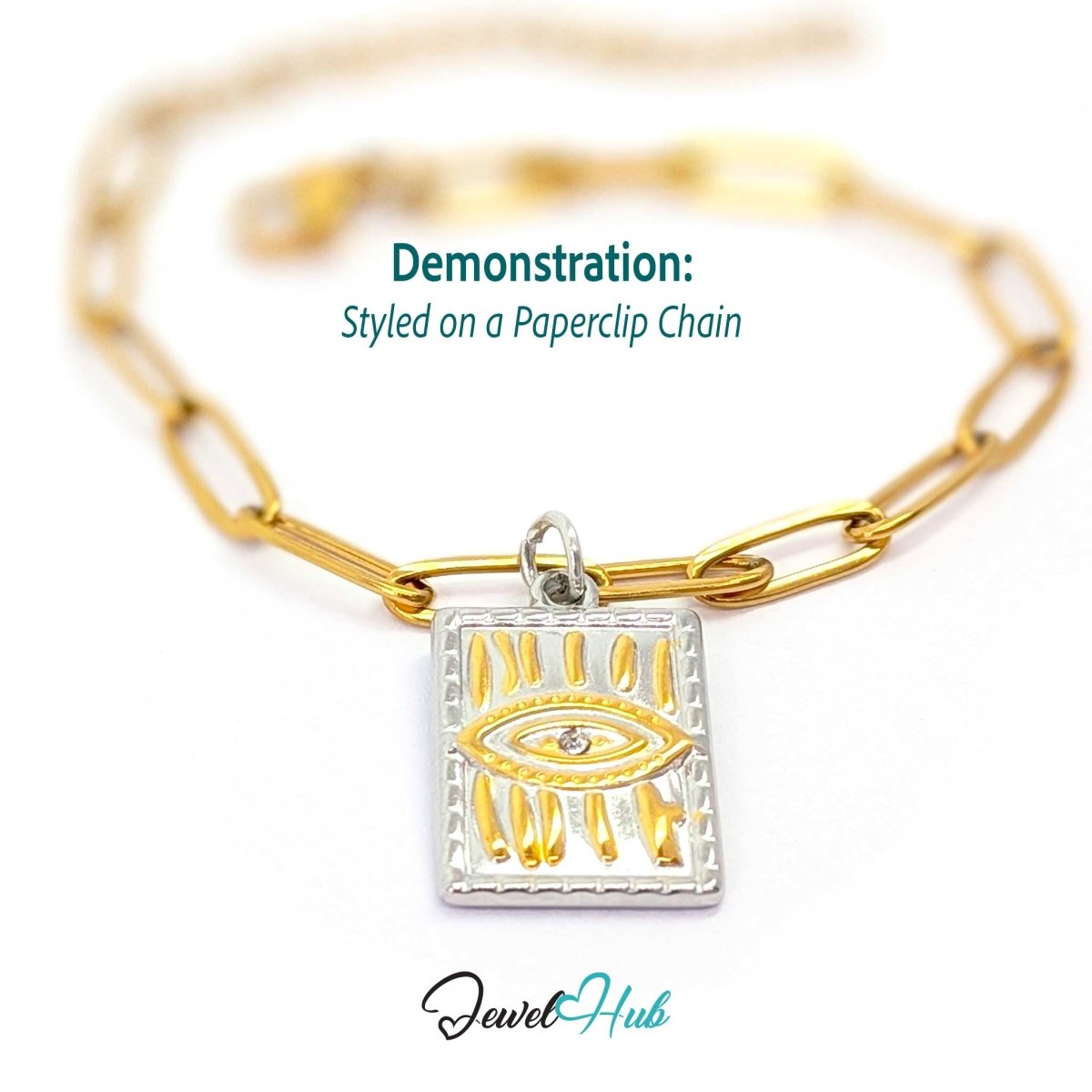 Evil Eye Plate charm, two-tone stainless steel, styled on a gold paperclip chain bracelet - JewelHub