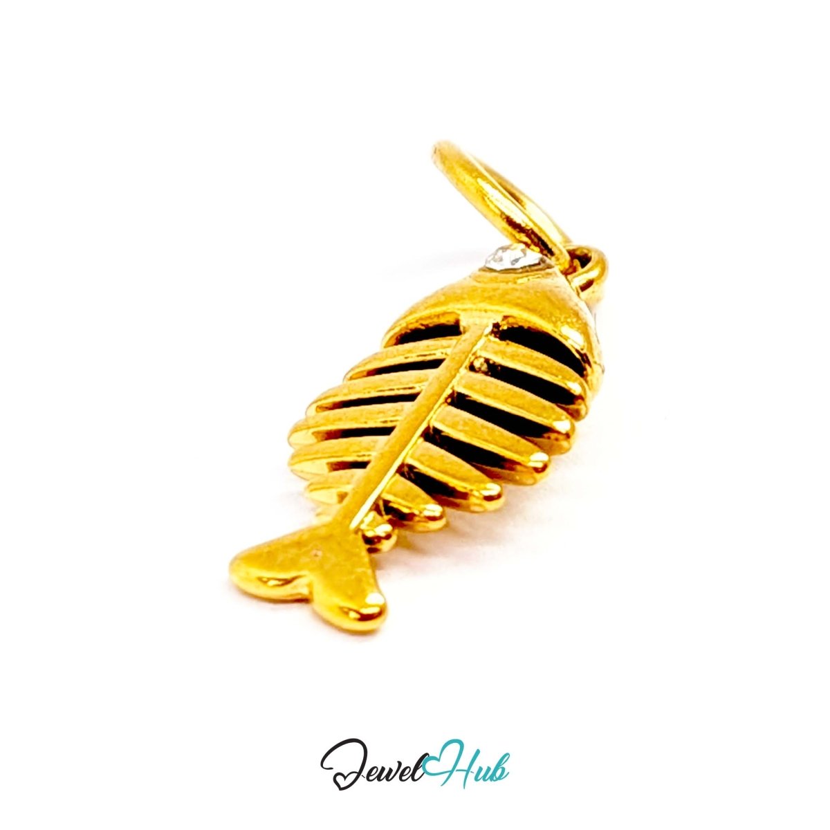 Fish bone charm in gold stainless steel with a crystal eye - angled view - JewelHub
