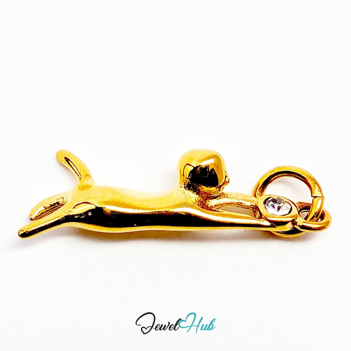 Gold hanging cat charm held horizontally to show its full 25mm stretch - JewelHub