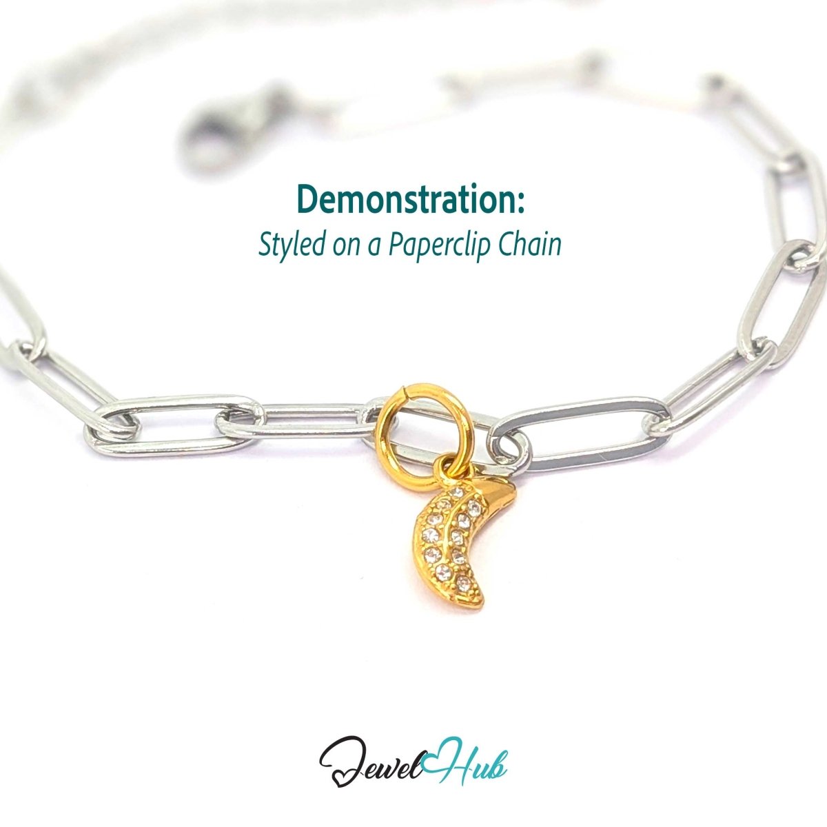 Gold Mini Moon charm styled on a silver paperclip chain bracelet - JewelHub