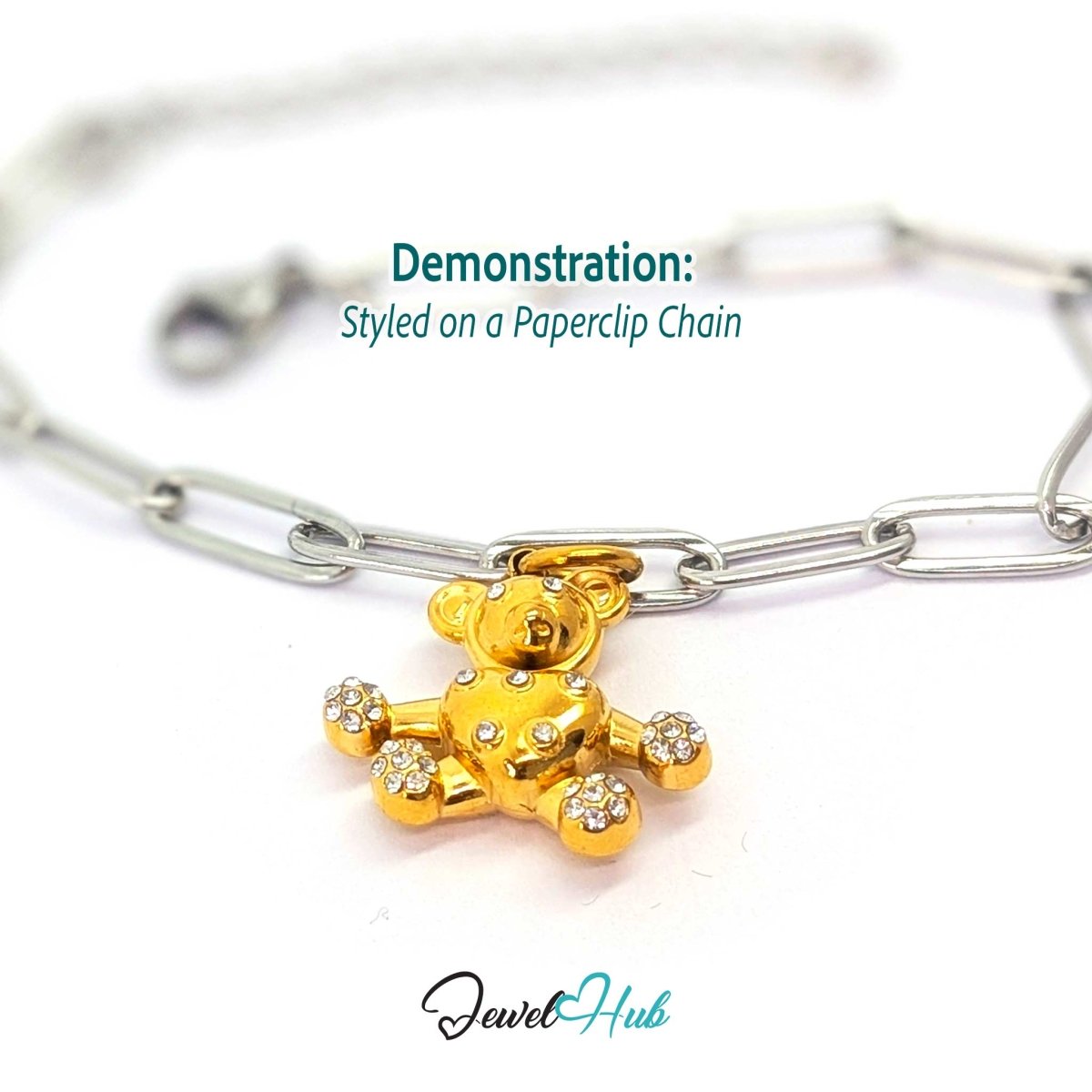 Gold crystal Open Arms Bear charm styled on a silver paperclip chain bracelet for a two-tone look - JewelHub