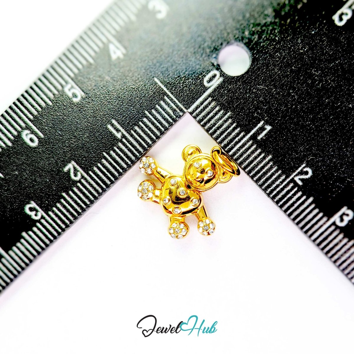Gold Crystal Open Arms Bear charm measured against a ruler at 18mm wide by 16mm tall - JewelHub
