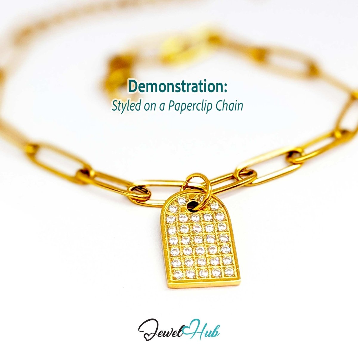 Pave Arch charm, gold stainless steel, styled on a gold paperclip chain bracelet - JewelHub