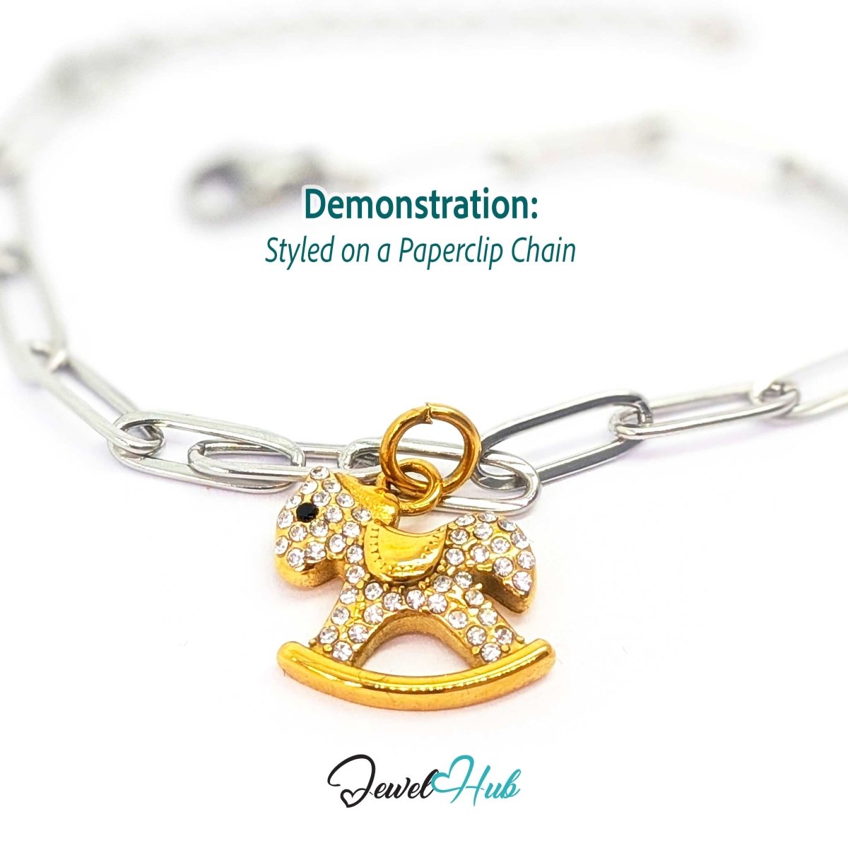 Gold crystal Rocking Horse charm styled on a silver paperclip chain bracelet for a two-tone look - JewelHub