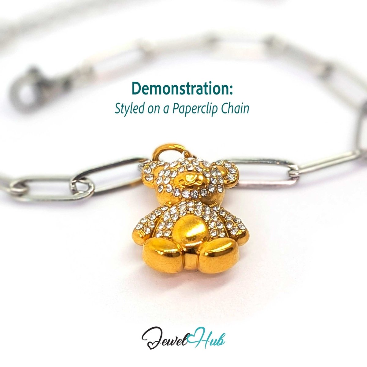 Gold crystal Sitting Bear charm styled on a silver paperclip chain bracelet for a two-tone look - JewelHub