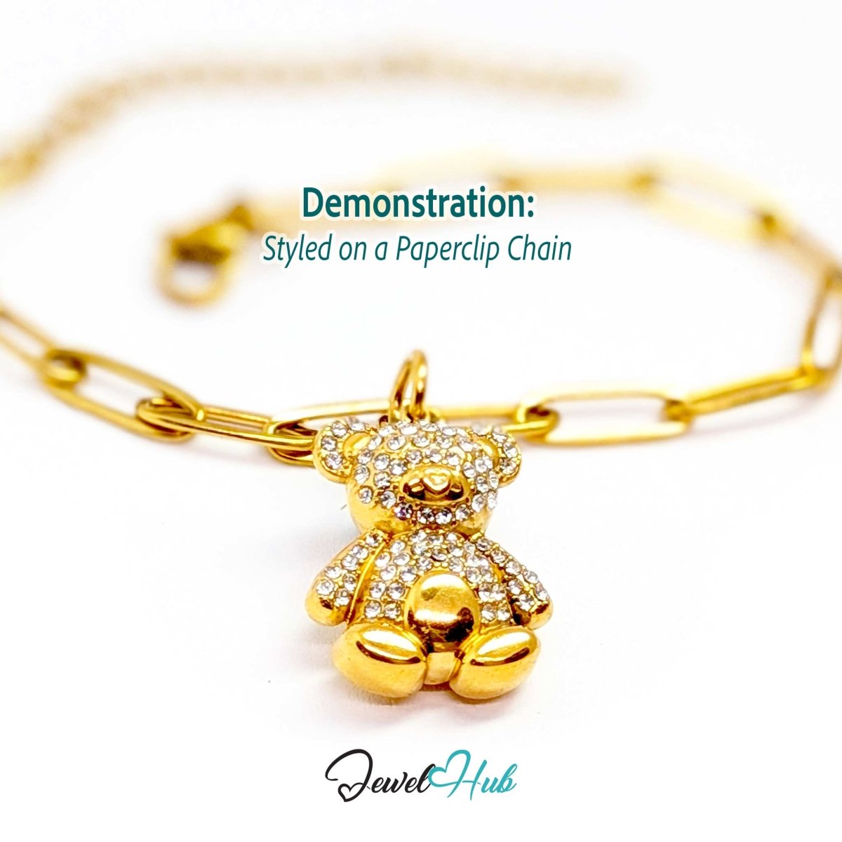 Gold crystal Sitting Bear charm styled on a gold paperclip chain bracelet - JewelHub
