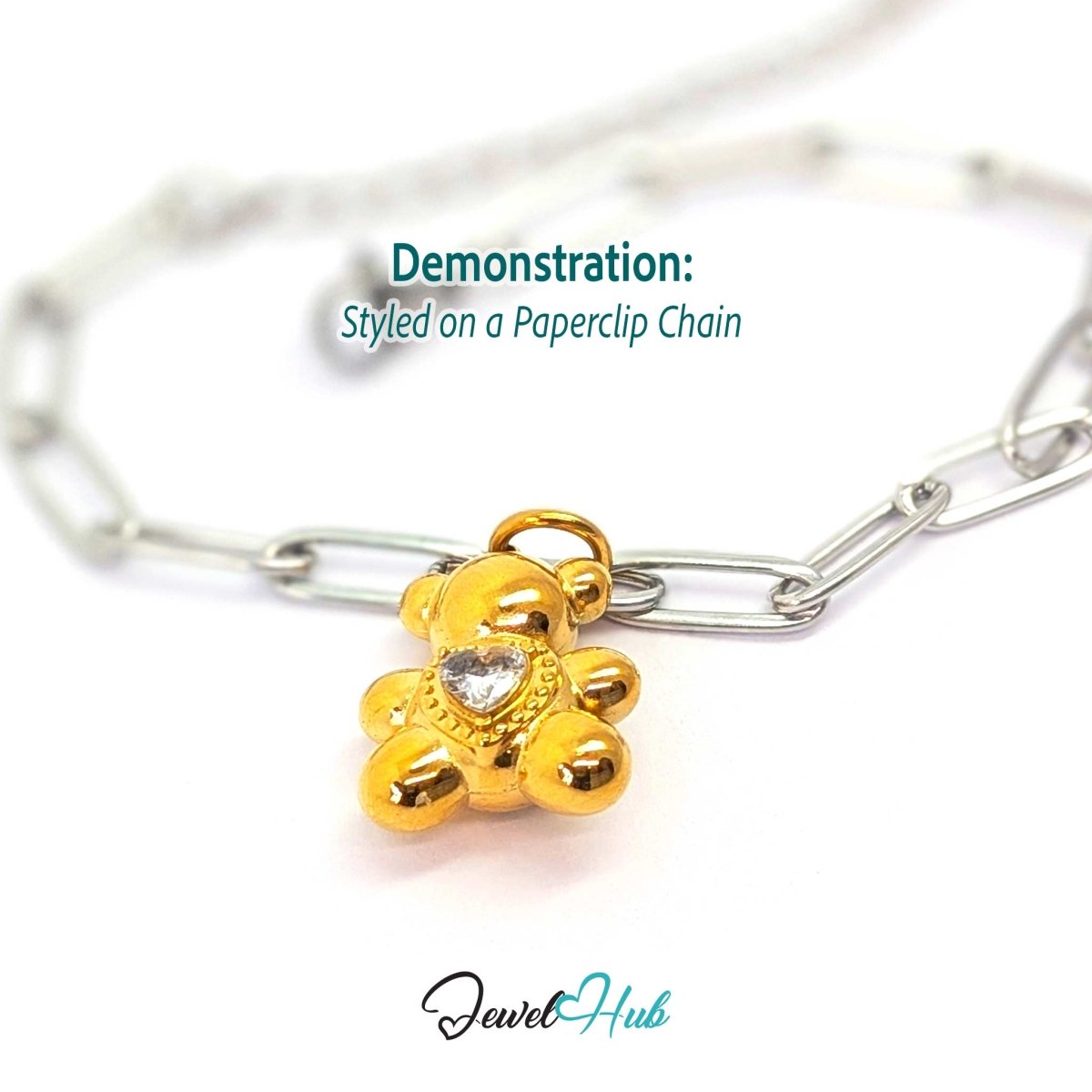 Gold crystal Solitaire Heart Bear charm styled on a silver paperclip chain bracelet for a two-tone look - JewelHub