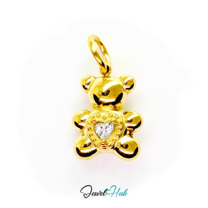 Small Crystal Solitaire Heart Bear charm in gold-tone stainless steel holding a single crystal heart - JewelHub