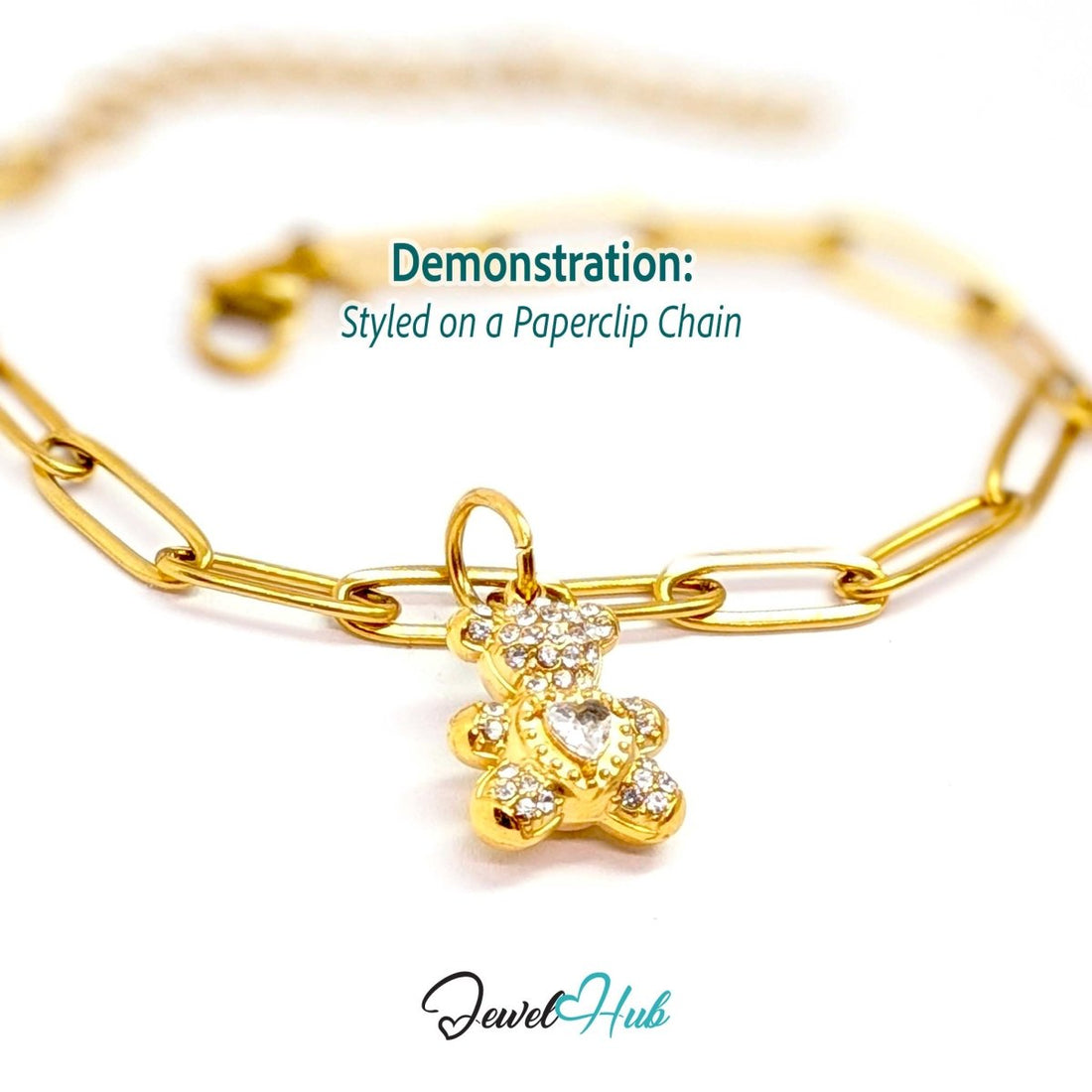 Gold crystal Sparkle Heart Bear charm styled on a gold paperclip chain bracelet - JewelHub