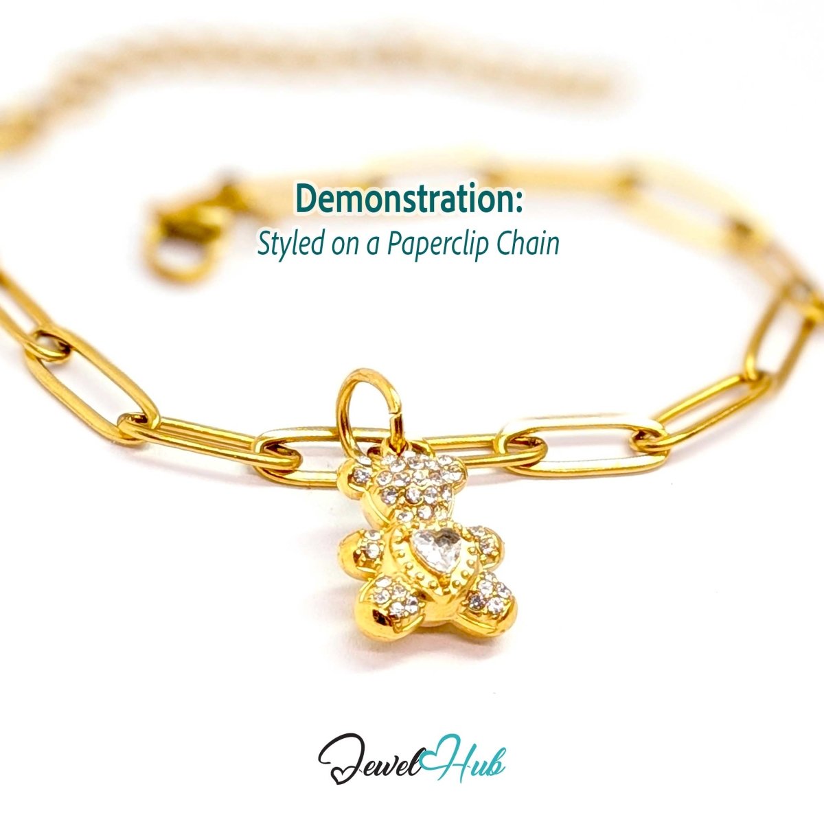 Gold crystal Sparkle Heart Bear charm styled on a gold paperclip chain bracelet - JewelHub