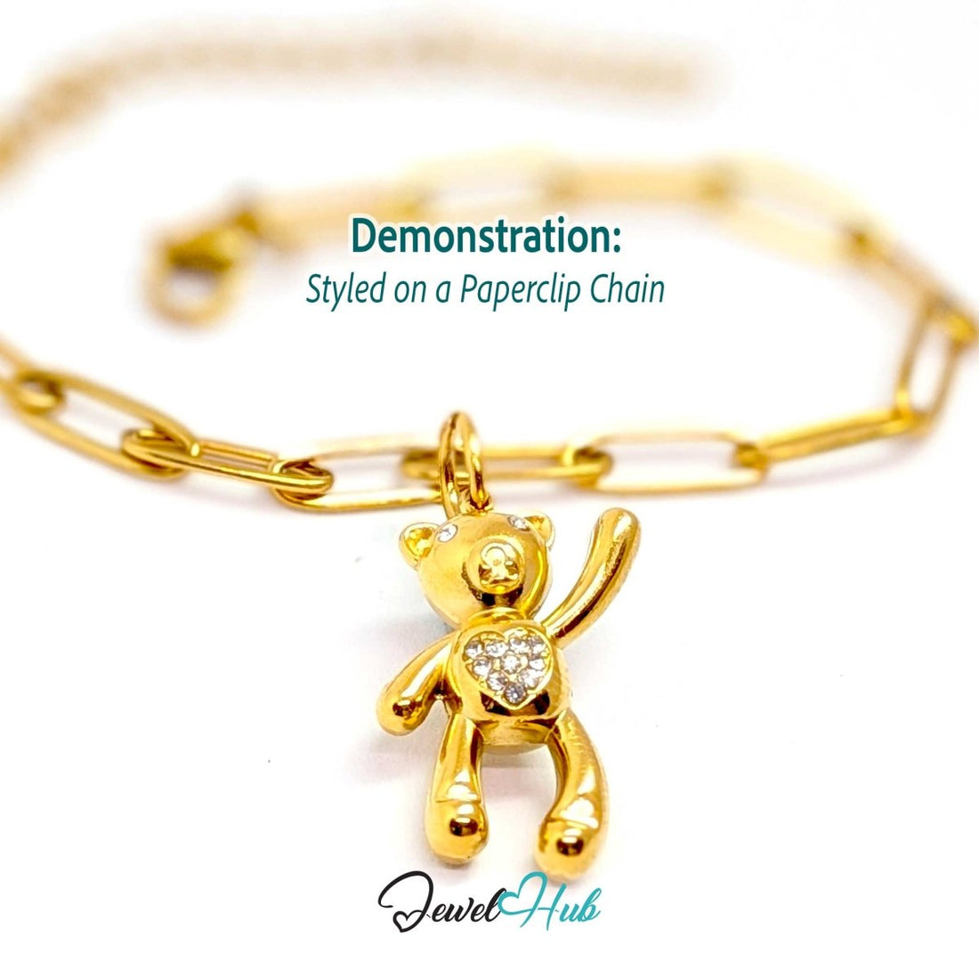 Gold crystal Tummy Bear charm styled on a gold paperclip chain bracelet - JewelHub