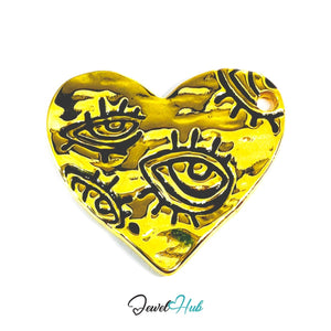 DuoTone Eye Motif Heart Pendant Gold Engraved Steel Charm - JewelHub.co.uk