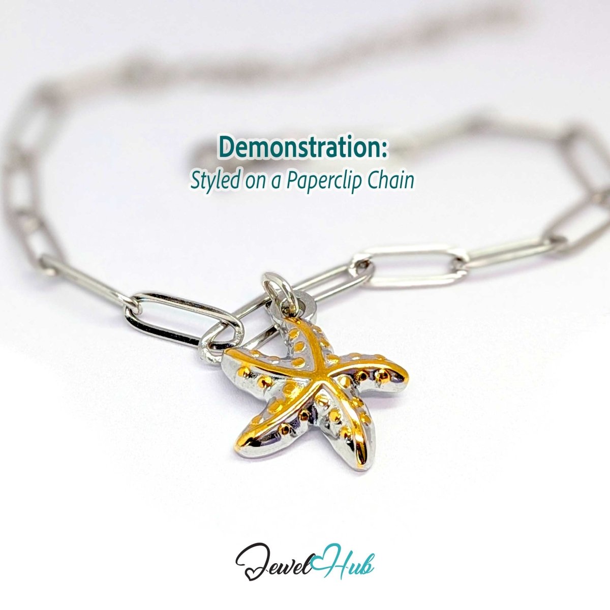 DuoTone starfish charm styled on a silver paperclip chain bracelet - JewelHub