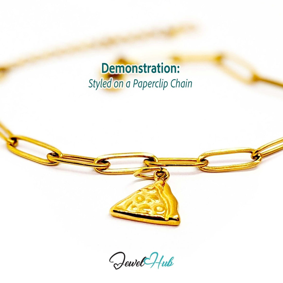 Embossed pizza slice charm in gold stainless steel - styled on a gold paperclip chain bracelet - JewelHub