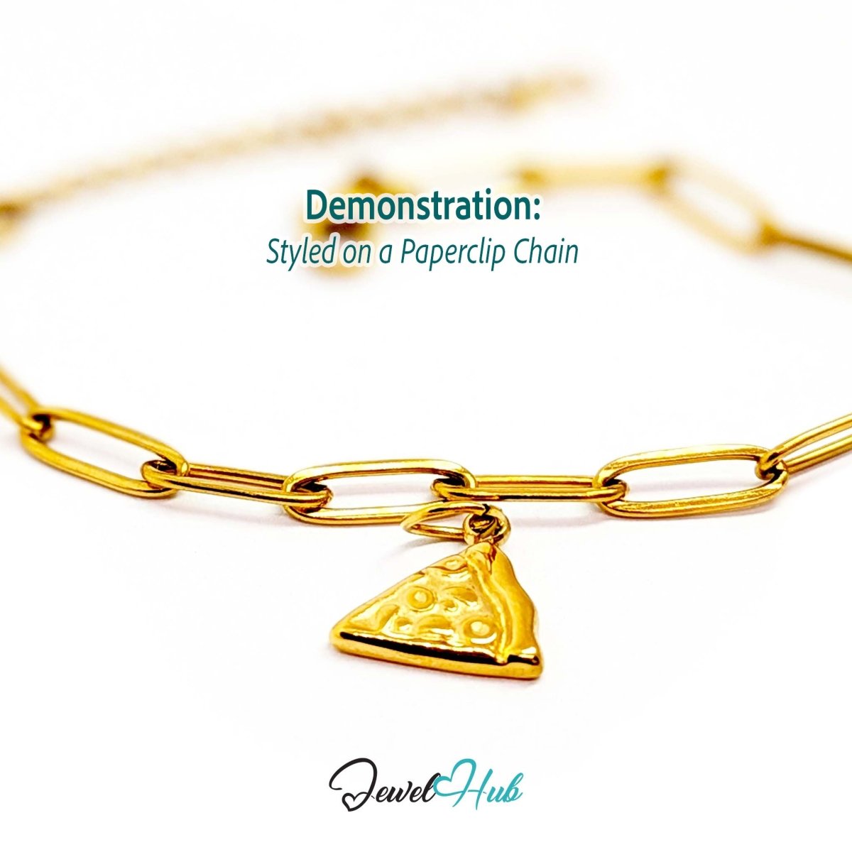 Embossed pizza slice charm in gold stainless steel - styled on a gold paperclip chain bracelet - JewelHub