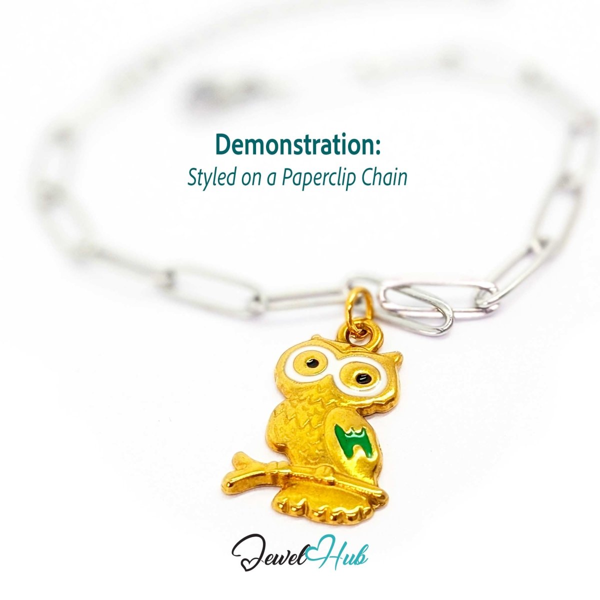Gold enamel owl charm styled on a silver paperclip chain bracelet for a two-tone look - JewelHub