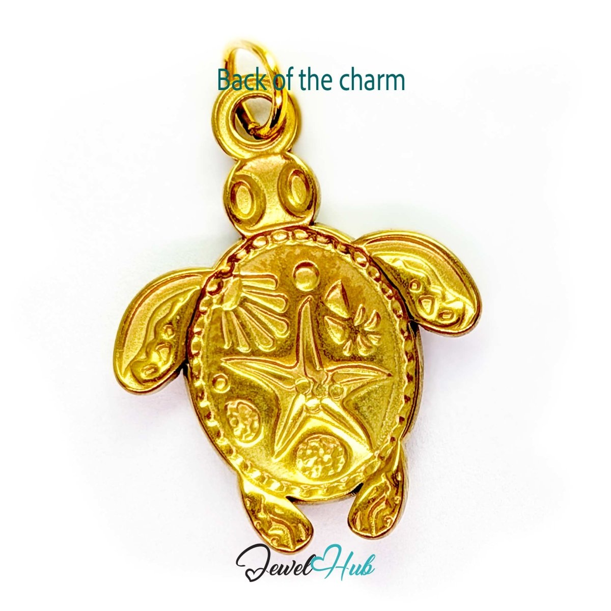 Back of the turquoise sea turtle charm - patterned gold underside with a raised starfish - JewelHub