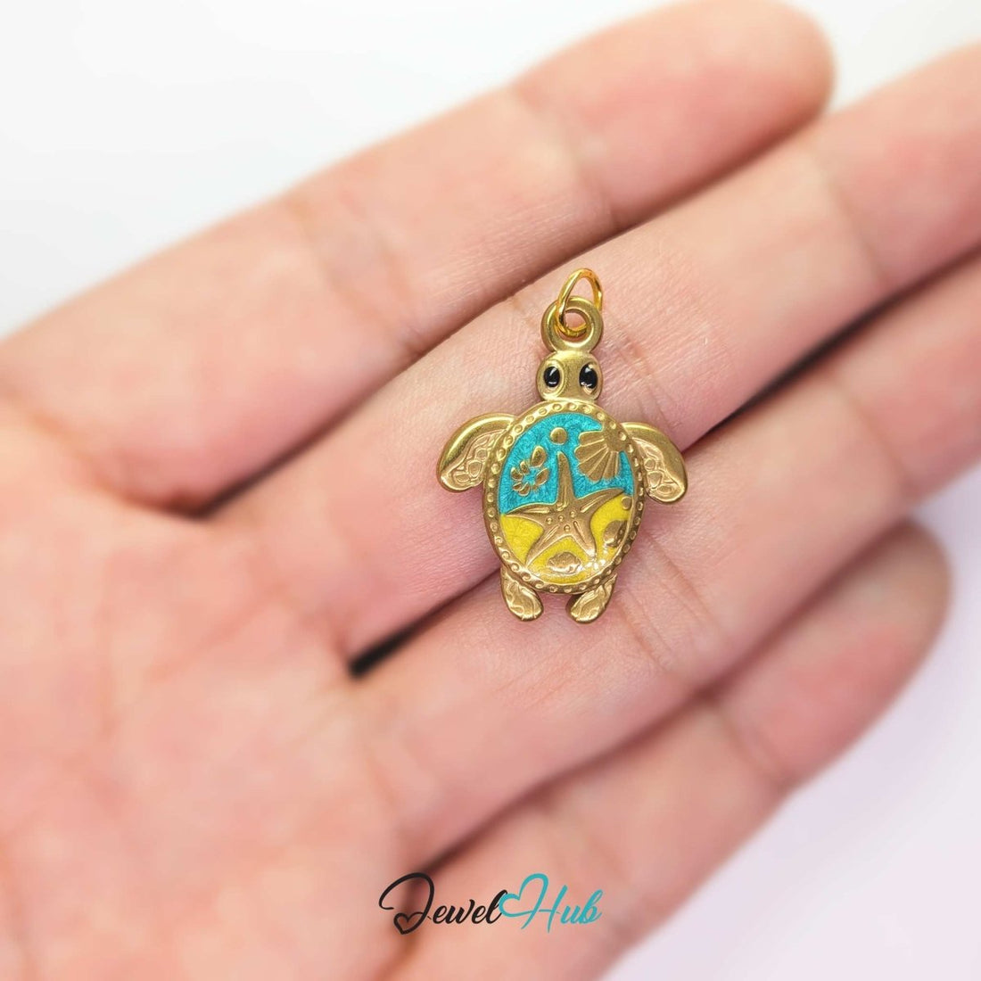 Sea turtle charm in gold stainless steel with a turquoise and yellow enamel shell - JewelHub