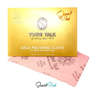 Town Talk Gold Polishing Cloth in its gold envelope, front view, with the pink cotton cloth fanned out beneath it — JewelHub.