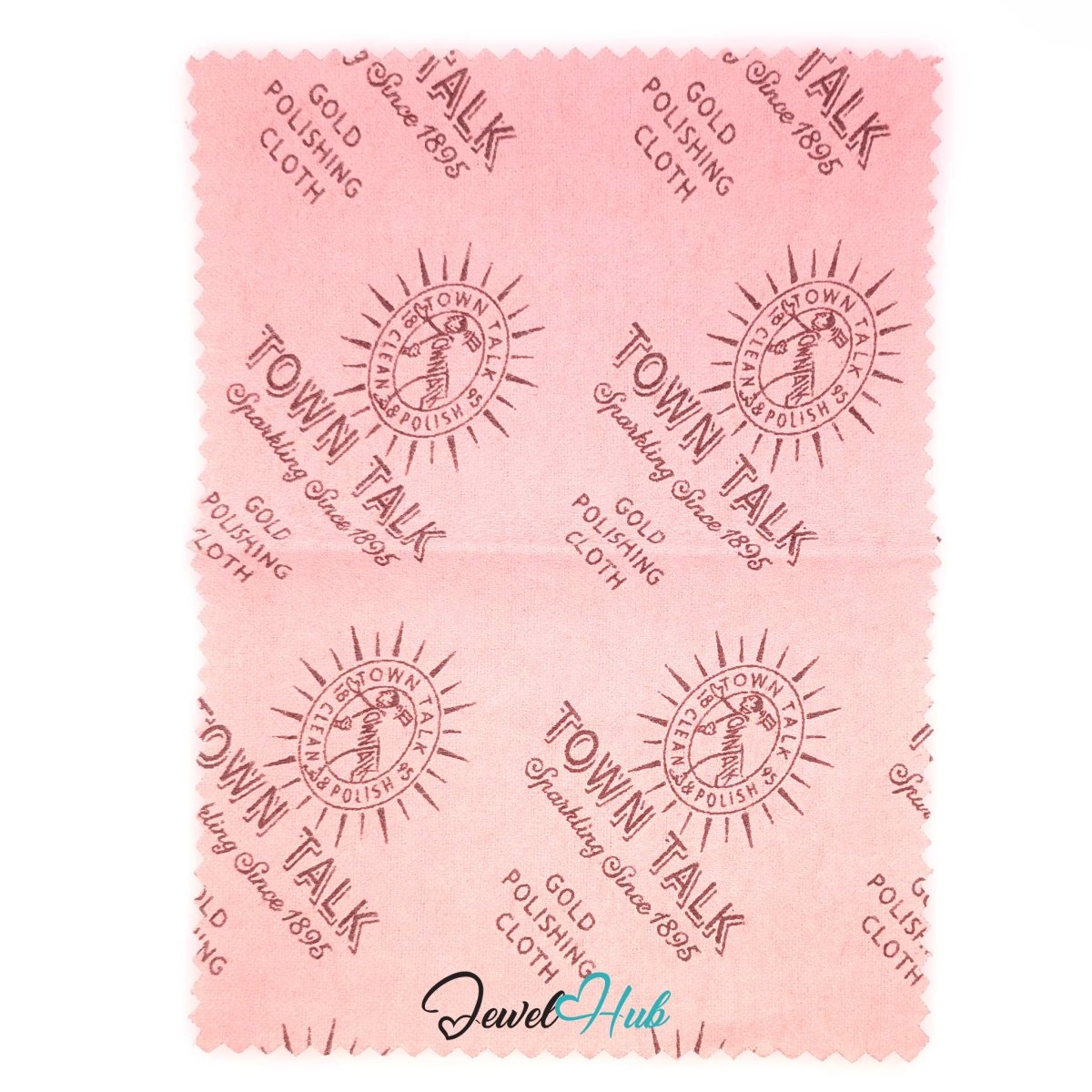 Close-up of the pink Town Talk gold polishing cloth showing the repeated sunburst crest and "Clean & Polish" print detail.