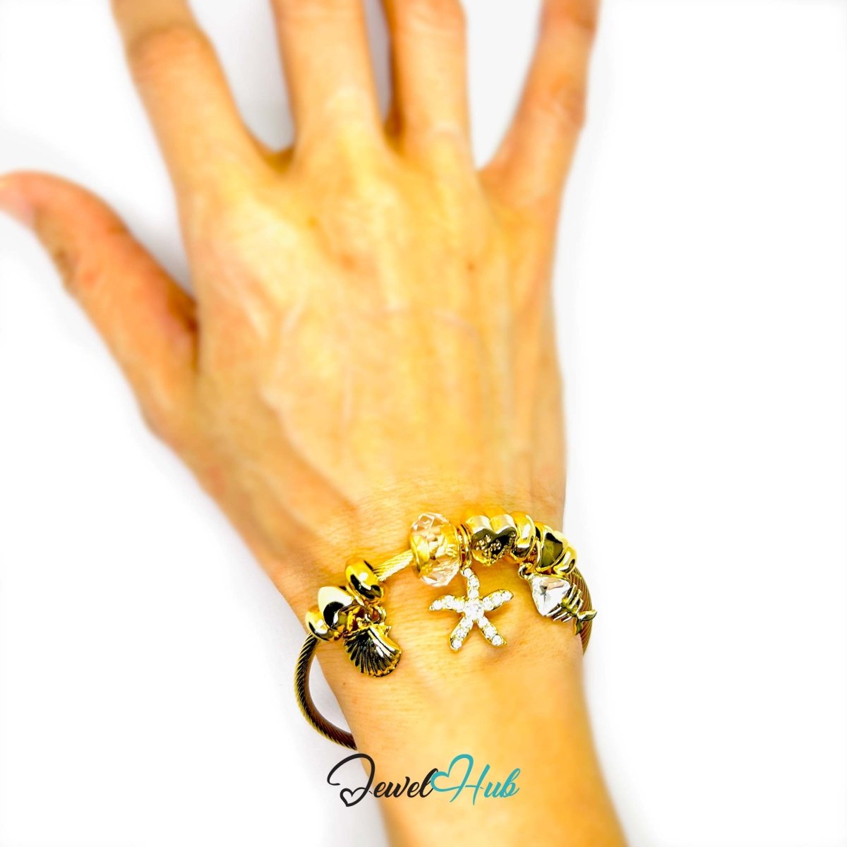 Gold Stainless Steel Crystal Gem Starfish Fishbone Charm Bangle - JewelHub.co.uk