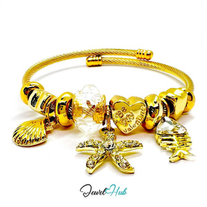 Gold Stainless Steel Crystal Gem Starfish Fishbone Charm Bangle - JewelHub.co.uk