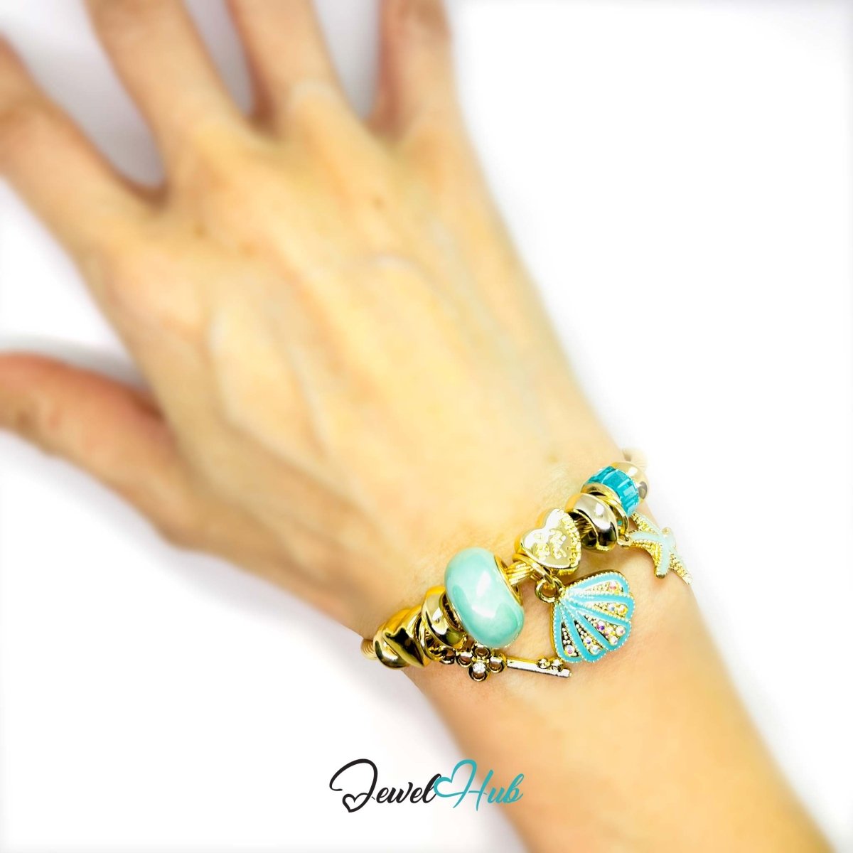 Gold Stainless Steel Cyan Shell & Starfish Beads Charm Bangle - JewelHub.co.uk