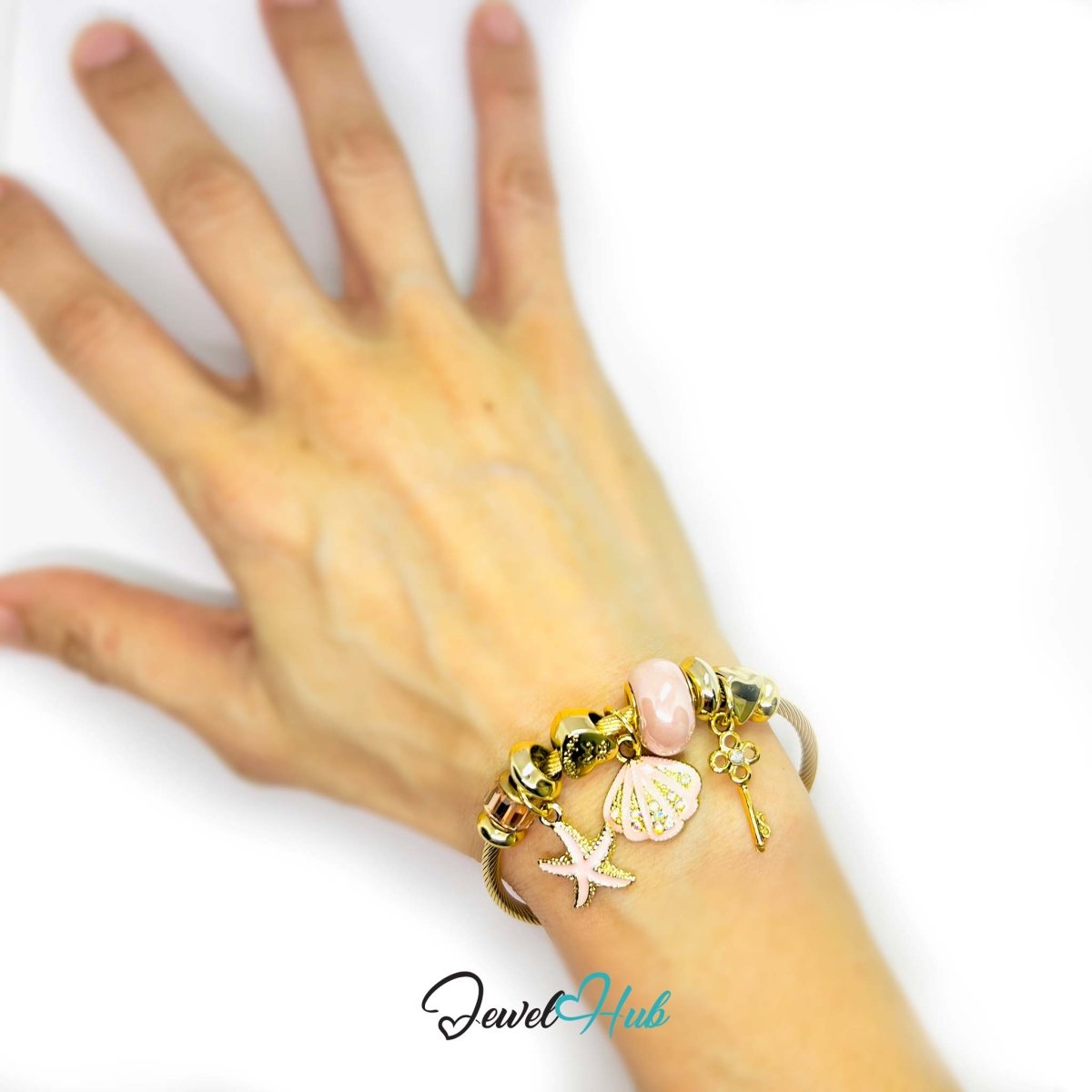 Gold Stainless Steel Pink Shell Starfish Beads Charm Bangle - JewelHub.co.uk