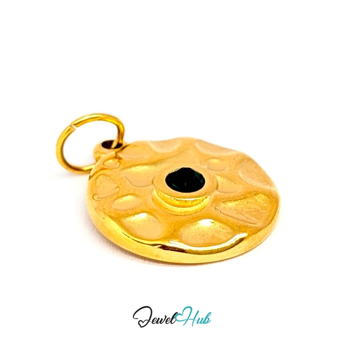 Hammered disc charm in gold stainless steel with a green stone - three-quarter view - JewelHub