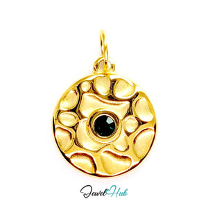 Hammered disc charm in gold stainless steel with a green stone - front view - JewelHub