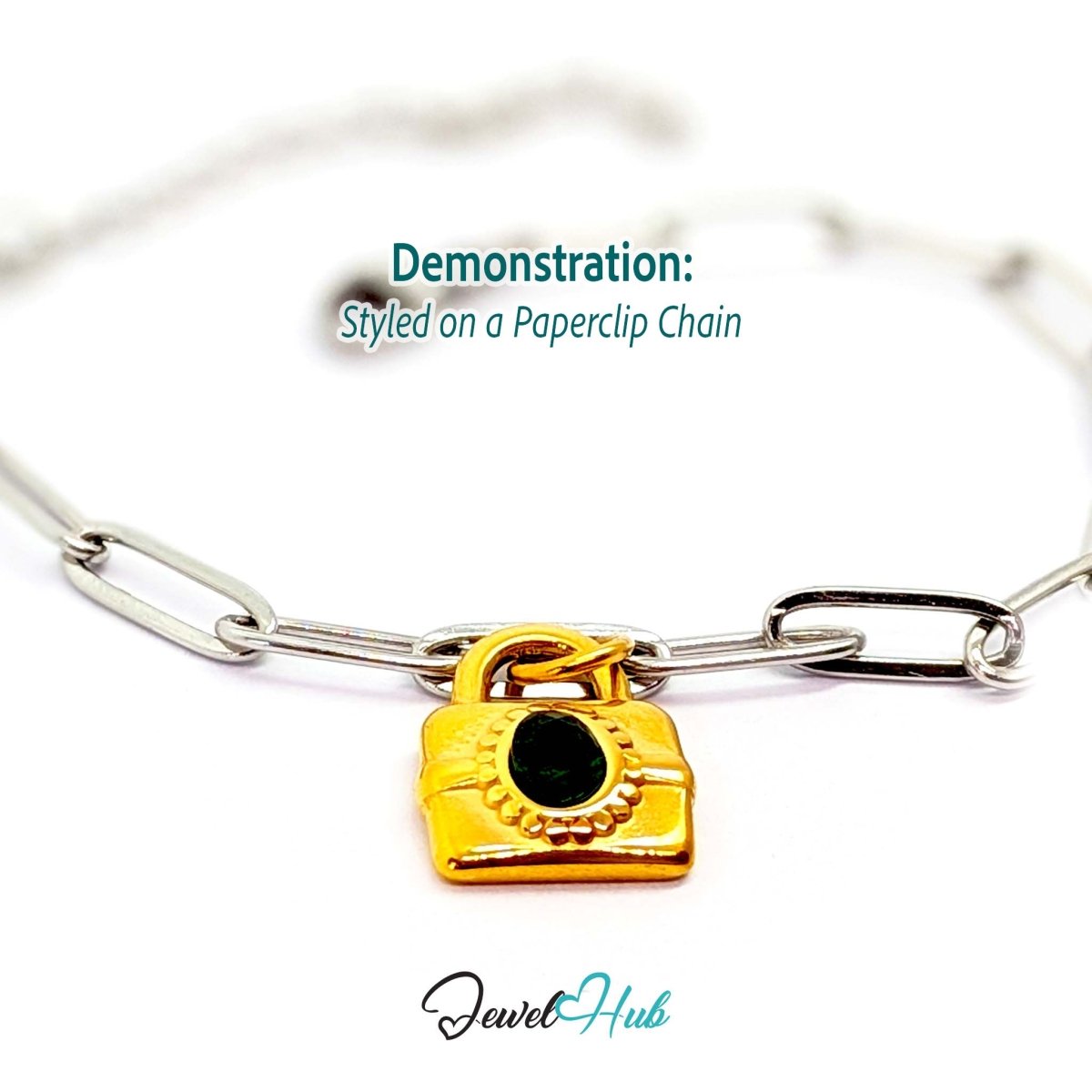 Green stone padlock charm in gold stainless steel - styled on a silver paperclip chain bracelet - JewelHub