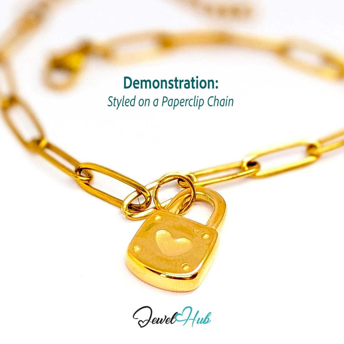 Heart padlock charm in gold stainless steel - styled on a gold paperclip chain bracelet - JewelHub