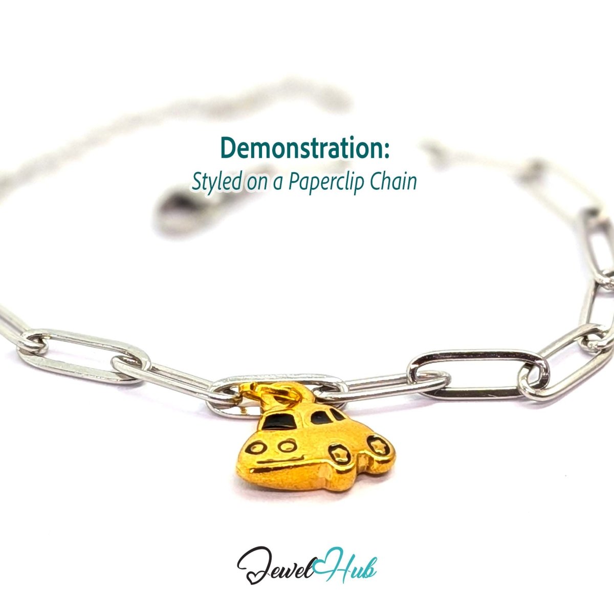 Little car charm in gold stainless steel with black enamel - styled on a silver paperclip chain bracelet - JewelHub