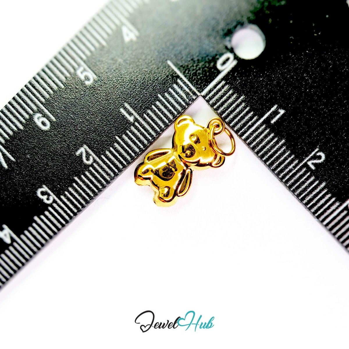 Gold Mini Classic Bear charm measured against a ruler at 11mm wide by 18mm tall - JewelHub