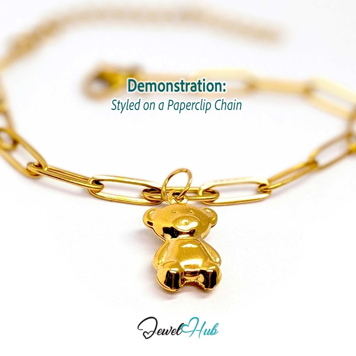 Gold mini Classic Bear charm styled on a gold paperclip chain bracelet - JewelHub