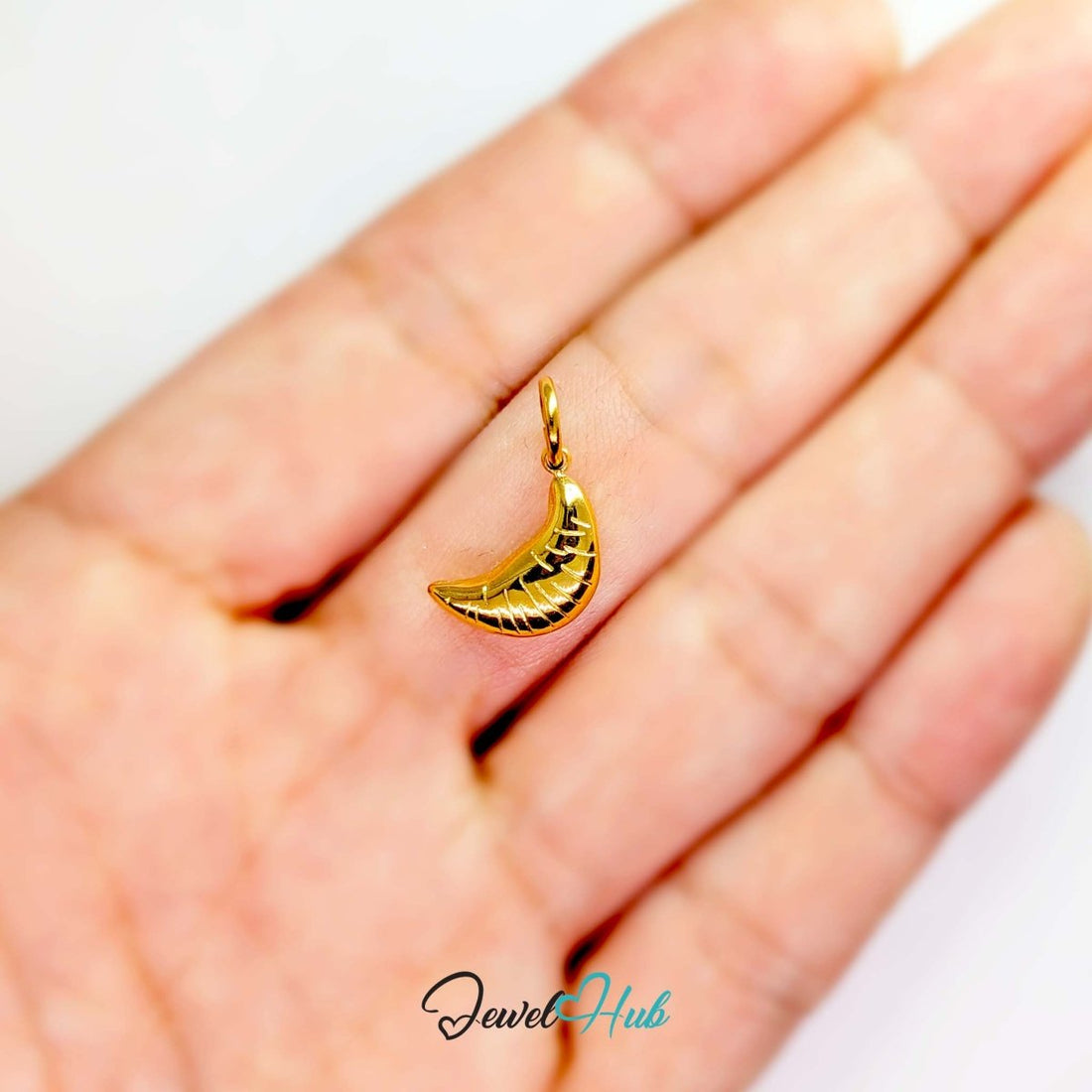 Mini croissant charm in gold stainless steel - front view - JewelHub
