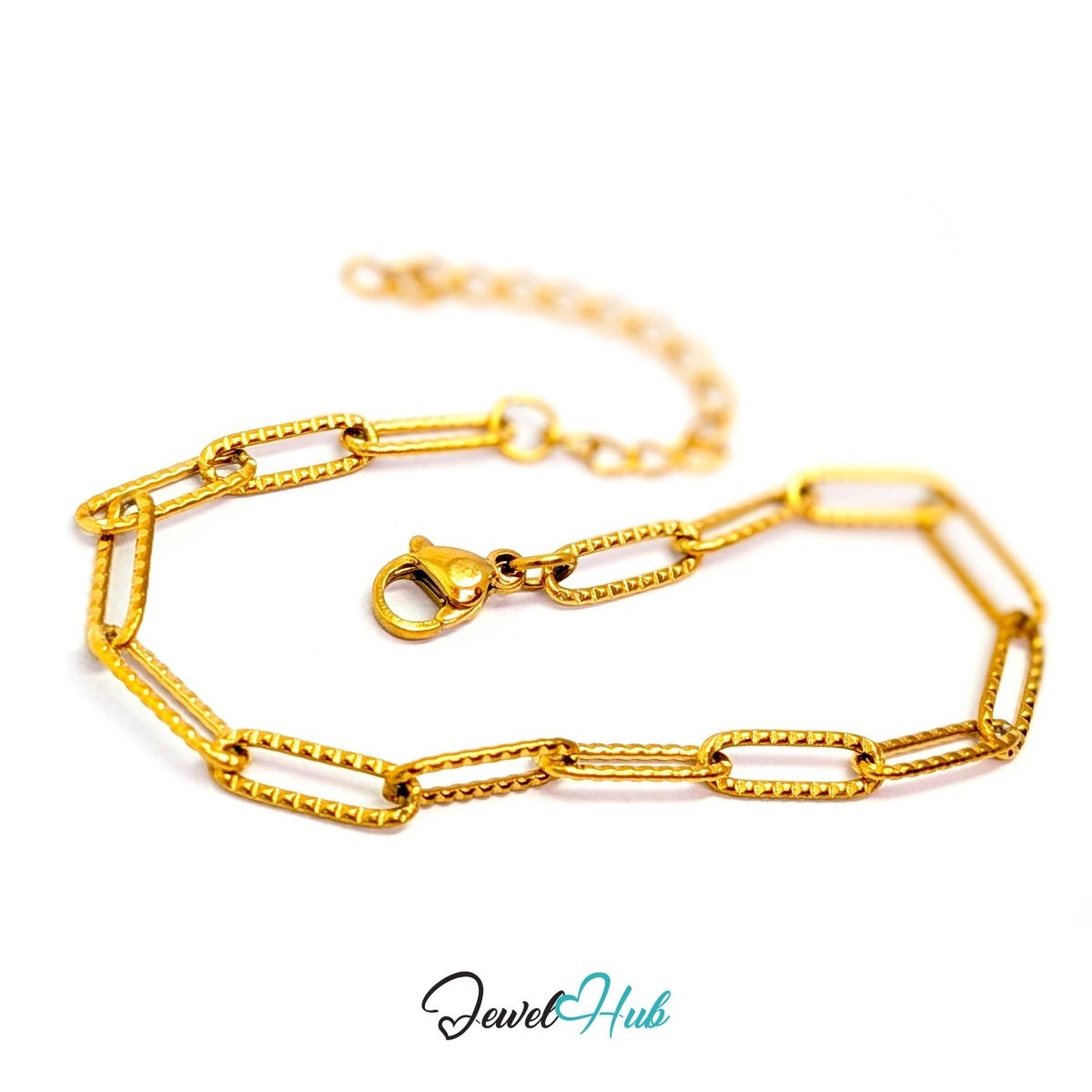 Patterned gold paperclip chain bracelet laid flat, adjustable from 16cm to 20cm - JewelHub